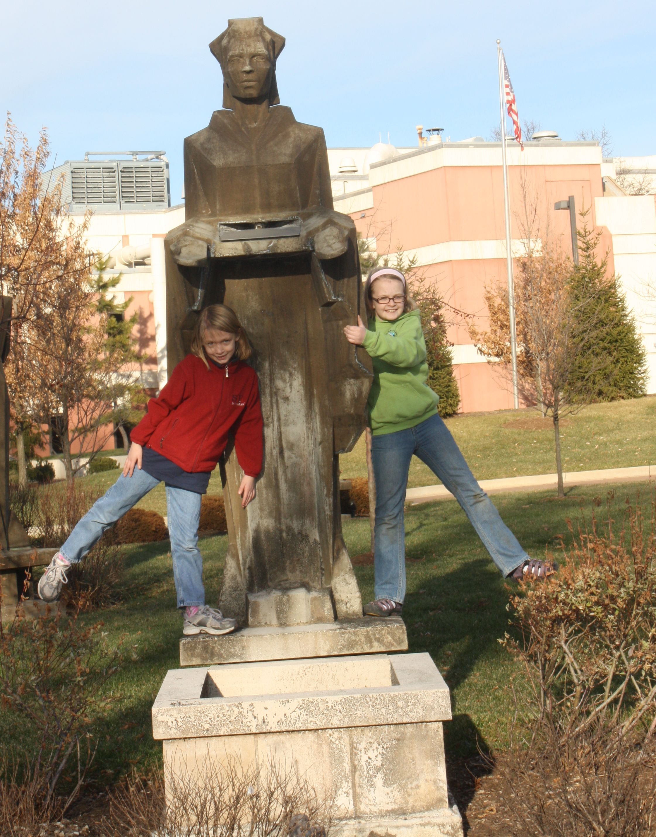 2012-01-07 JnC w statue at Petrolite.jpg
